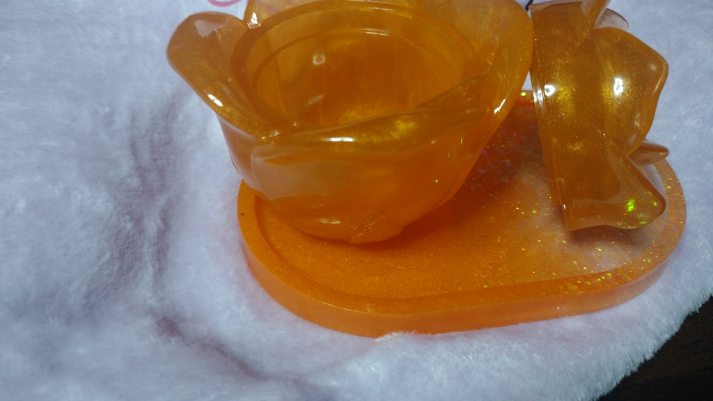 Resin made orange rose jar and matching plate