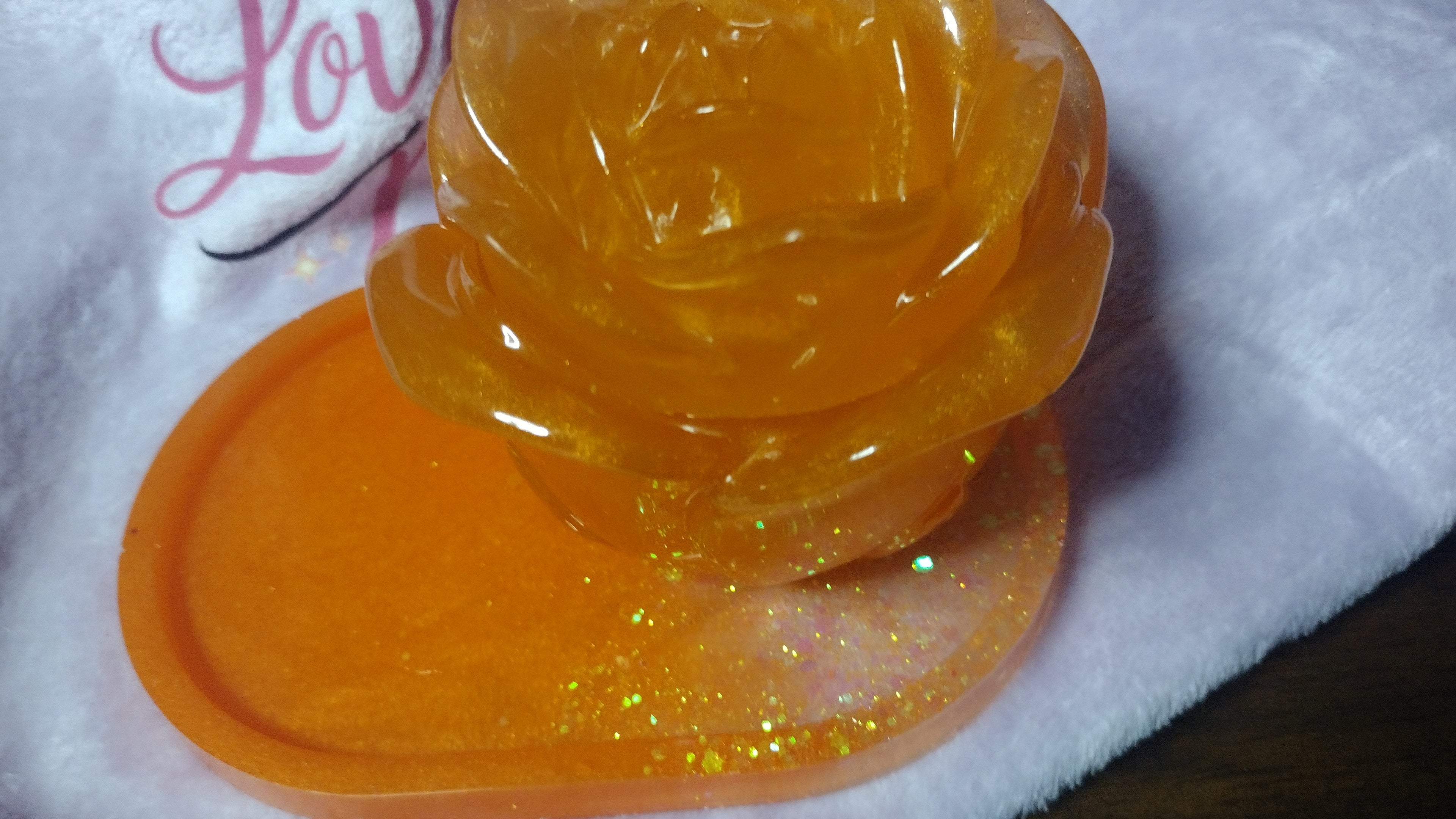 Resin made orange rose jar and matching plate